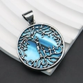 Detailed macro view of retro silver Tree of Life pendant with vibrant blue shell inlay - 32x36mm / Bright Blue