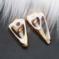 Detail of natural spiral seashells with gold plated edges and metal rings for DIY jewelry - Style 55