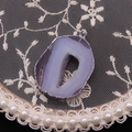 Close-up of natural purple agate slice pendant with silver plating and raw geode center - Light Purple (No. 5)
