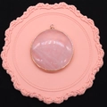 Elegant round rose quartz pendant with gold plated edges and natural stone textures - Rose Quartz