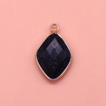 Blue sand stone diamond-shaped pendant with gold-plated edges on a pink background - 15x26mm / Blue Sandstone
