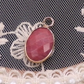 Faceted oval rose red natural stone pendant with gold plating and ring connector - 11x19mm / Rhodonite