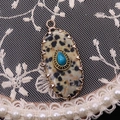 Oval Dalmatian Jasper pendant with turquoise teardrop inlay and golden sawtooth bezel - 16x36mm, 4g / Dalmatian Jasper