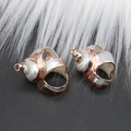 Pair of natural shell pendants with elegant rose gold plated edges and metal loops - Style 35