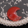 Macro shot of red crescent moon pendant with white texture on white lace background - 25x30mm, 8mm Thickness / Watermelon Quartz