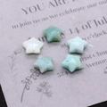Macro shot of 12mm faceted star-shaped Amazonite beads for DIY jewelry making - Amazonite