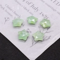 Close-up of five light green star-shaped faceted natural stone beads for DIY jewelry - Number 6 (Light Green Semi-precious Stone)