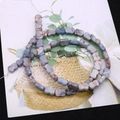 Macro view of blue imperial stone bone beads with natural marble patterns for jewelry DIY - Grey Blue