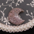Polished pink crescent moon natural stone with purple speckled texture on lace - 25x30mm, 8mm Thickness / Cherry Blossom Agate