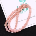 Macro shot of pink heart-shaped imperial jasper beads for DIY jewelry making - 1 Piece / Pink (Color 1)