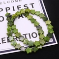 Strand of polished green natural stone beads in flower shape for DIY jewelry making - 10x10x4mm / No.3 (Light Green)