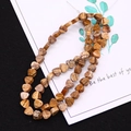 Macro shot of natural brown picture jasper triangle beads for DIY jewelry making - 1 Piece / Brown (No.3)