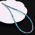 Macro shot of sky blue imperial jasper cylinder beads for jewelry making - 4x8mm / Sky Blue (No.11)
