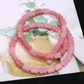 Pink bow-shaped synthetic stone beads 6x8mm for DIY jewelry making and crafting - Pink