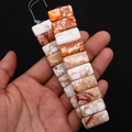 Nahaufnahme rechteckiger Kaiserstein-Perlen mit orangefarbener Marmorierung für DIY-Schmuck - 10x20mm (Dicke 6mm) / Nr.16 (Weiß Orange Braun Marmoriert)