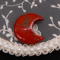 Polished Red Jasper crescent moon gemstone with natural texture and marble patterns - 25x30mm, 8mm Thickness / Red Jasper
