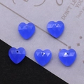Macro shot of 5 faceted heart-shaped blue-purple stone pendants for DIY jewelry making - US 5