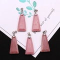 Macro view of five pink natural stone trapezoid pendants with silver metal clasps - Trapezoid Pendant Set / Rhodonite