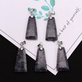 Set of five trapezoid labradorite pendants with silver metal clasps on a white background - Trapezoid Pendant Set / Black Spectrolite