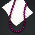 Macro detail of 8mm purple tiger eye beads with silk luster for jewelry making - Deep Purple (Style 8)