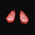 Detail view of red marbled shield-shaped stone pendants with pre-drilled holes for DIY jewelry - 17x30mm / Red with White Marble Pattern (No. 1)