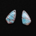 Macro detail of sky blue imperial stone shield pendants with brown veined textures - 17x30mm / Sky Blue with Reddish Brown Network (No. 6)