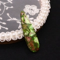 Macro detail of tear drop emperor stone pendant with green marbled texture and smooth finish - Emerald Light Green Dark Brown (No. 4)