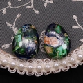 Detailed view of teardrop synthetic turquoise pendants with mottled green texture - Teardrop Pendant Only (3#) / 18x25mm