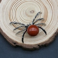 Spider shaped vintage pendant with silver metal legs and a reddish brown bead - 34x47mm / Red Jasper