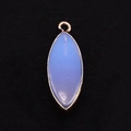 Detailed macro view of opal marquise pendant with elegant gold plated metal edges - Opal