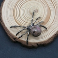 Silver spider pendant with natural pink stone on rustic wooden background texture - 34x47mm / Rhodonite