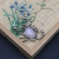 Colgante de escorpión en plata vintage con gema rosa ovalada sobre fondo bambú - Forma de Escorpión (1065-T250515005)
