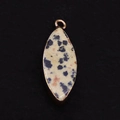 Dalmatian Jasper marquise stone pendant with rose gold plating on a black background - Dalmatian Jasper