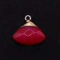 Detailed macro view of fan-shaped red stone pendant with faceted surface and gold loop - Carnelian