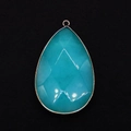 Macro detail of faceted teardrop gemstone pendant with elegant gold plated edge - 31x55mm (1008-T250407011) / US 4