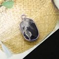 Oval picture stone pendant with silver plated edge and dark grey marble texture - US 9
