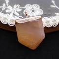 Macro shot of geometric orange aventurine stone pendant with rose gold metal edging and bail - 20x30mm / Orange Red Stone (No. 7)
