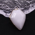 Pentagon cut white gemstone pendant with gold-plated edges and circular loop hook - White Jade