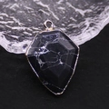 Shield shaped black marble pendant with gold plated edges and natural white veining - Black Line Howlite