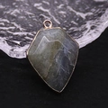 Labradorite shield pendant with gold plated edges and gray gemstone texture - Flash Stone (Labradorite)