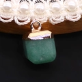 Detailed close-up of green natural stone pendant with gold clasp on white lace choker - 10x15mm / Green Aventurine