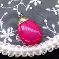 Close-up of rose red teardrop stone pendant with gold clasp on white lace background - 20x35mm / Dark Red (No. 4)