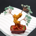 Miniature wealth tree ornament with green natural stone leaves and a dark red glazed base - Green Aventurine