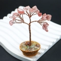 Mini albero della vita in cristallo rosa con filo di rame in un cesto intrecciato - Quarzo Cocomero