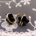 Star-shaped black stone stud earrings with gold wire wrap and minimalist design - Black Agate