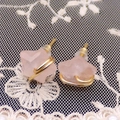 Star-shaped pink rose quartz earrings with gold wire wrap and silicone backings - Rose Quartz
