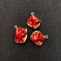 Three red dyed natural shell pendants with gold plated irregular tooth shape edges - Red