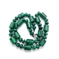 Malachite stone necklace with cylindrical beads and silver lobster clasp on white background - Malachite