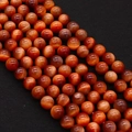 Close-up of natural red tiger eye beads with chatoyant effect for jewelry making - Reddish Brown (No.11)