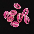 Close-up of eight handmade natural cowrie shells with pink edges and green polka dots - No. 9 (20 Pieces/pack) / 9x19mm,1.5g